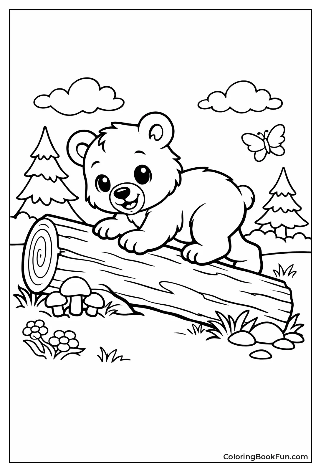 Bear Cub Climbing Fallen Log