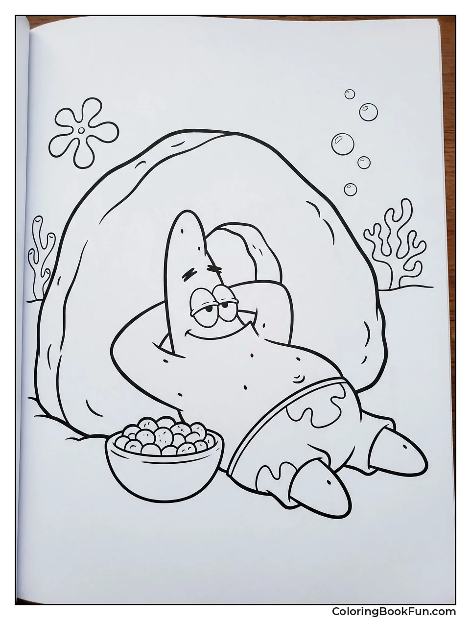 Lazy Patrick Under Rock