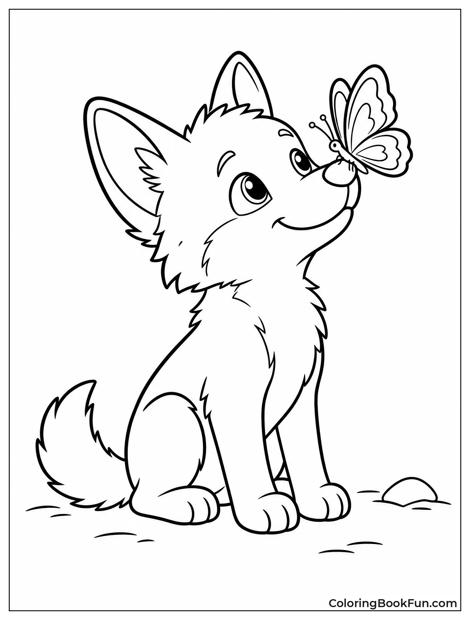 Coyote Pup Watching Butterfly Closely