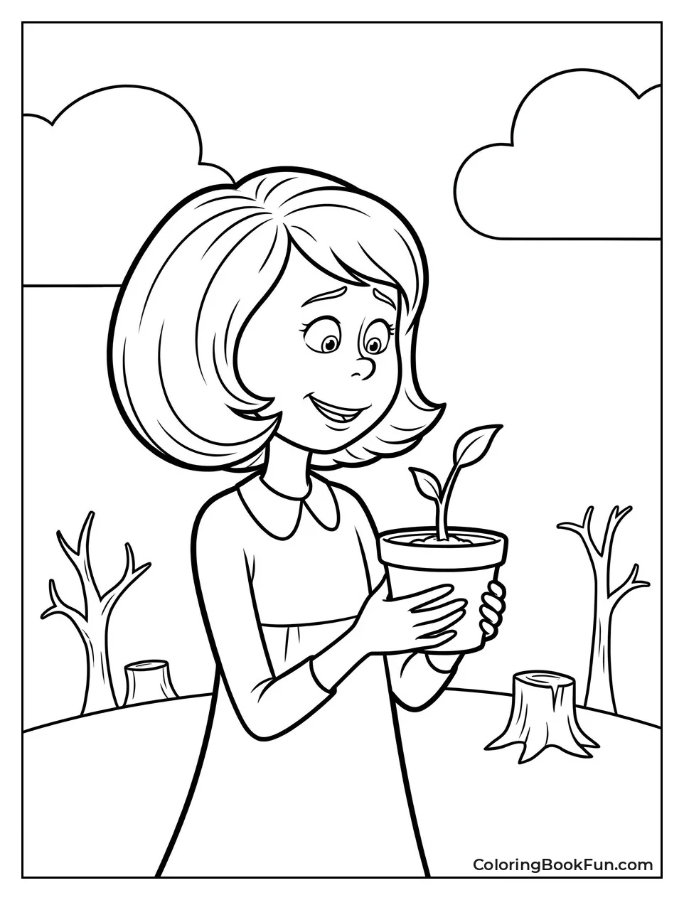Audrey Holding a Seedling