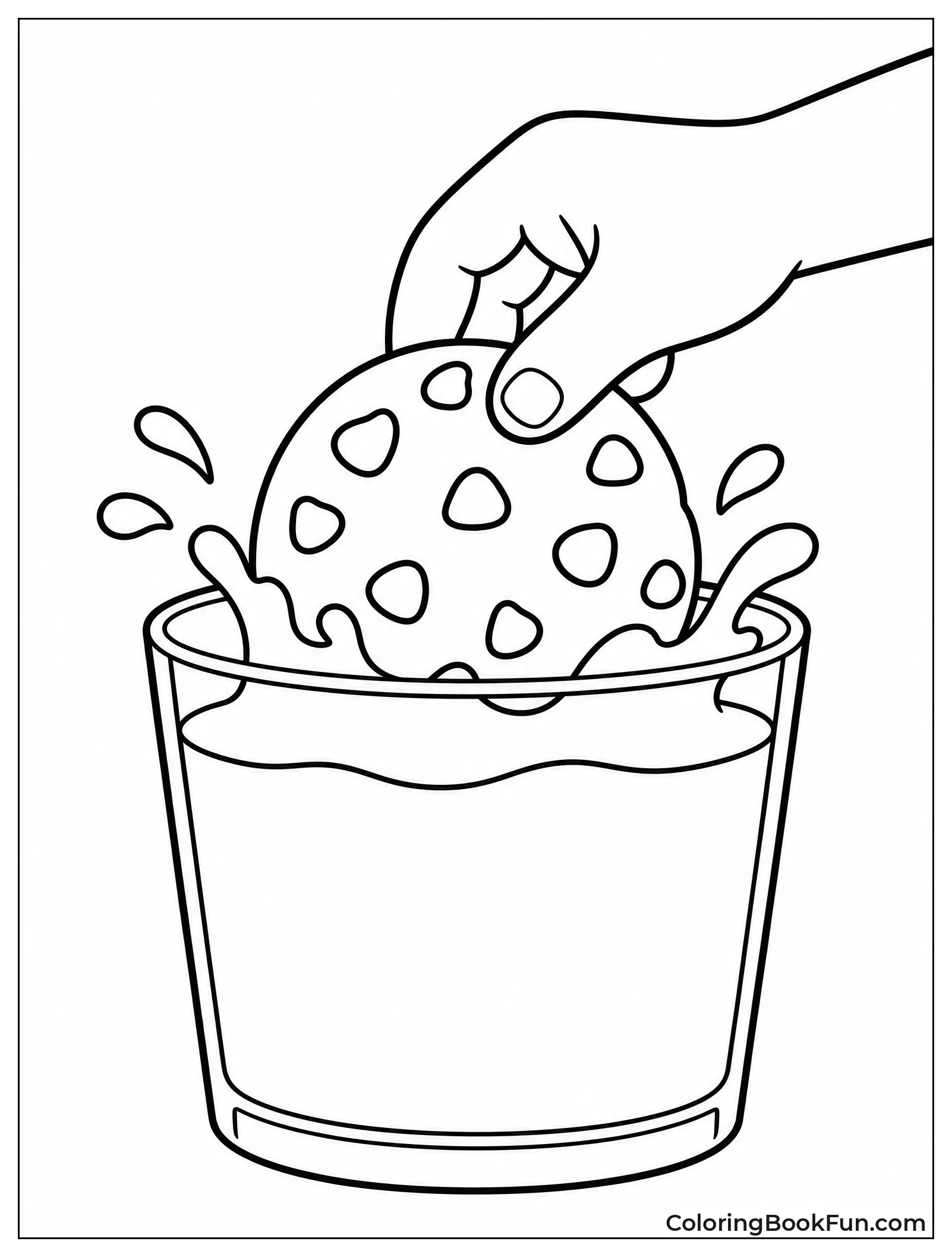 Hand Dipping Cookie in Milk