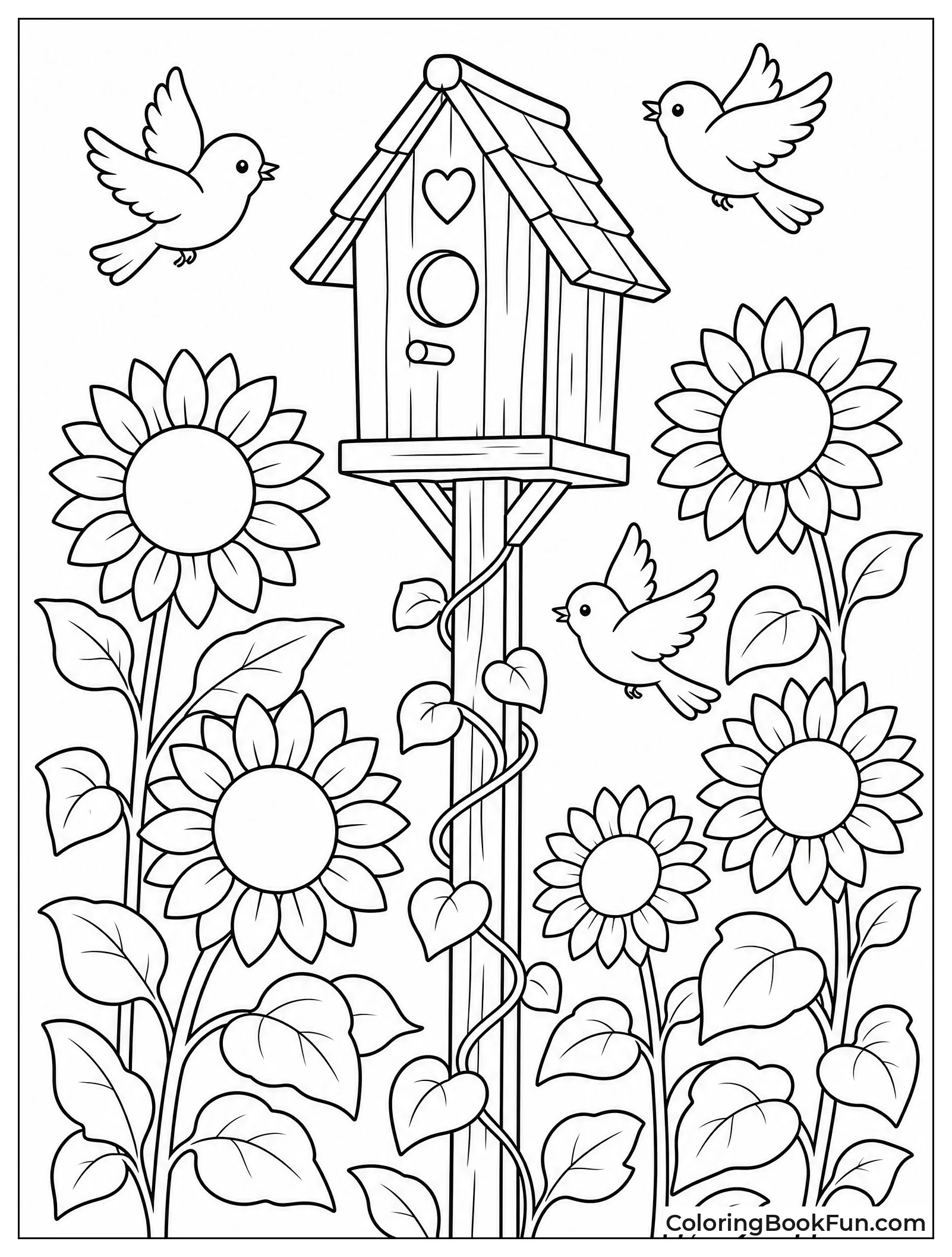 Birdhouse beside Tall Sunflowers