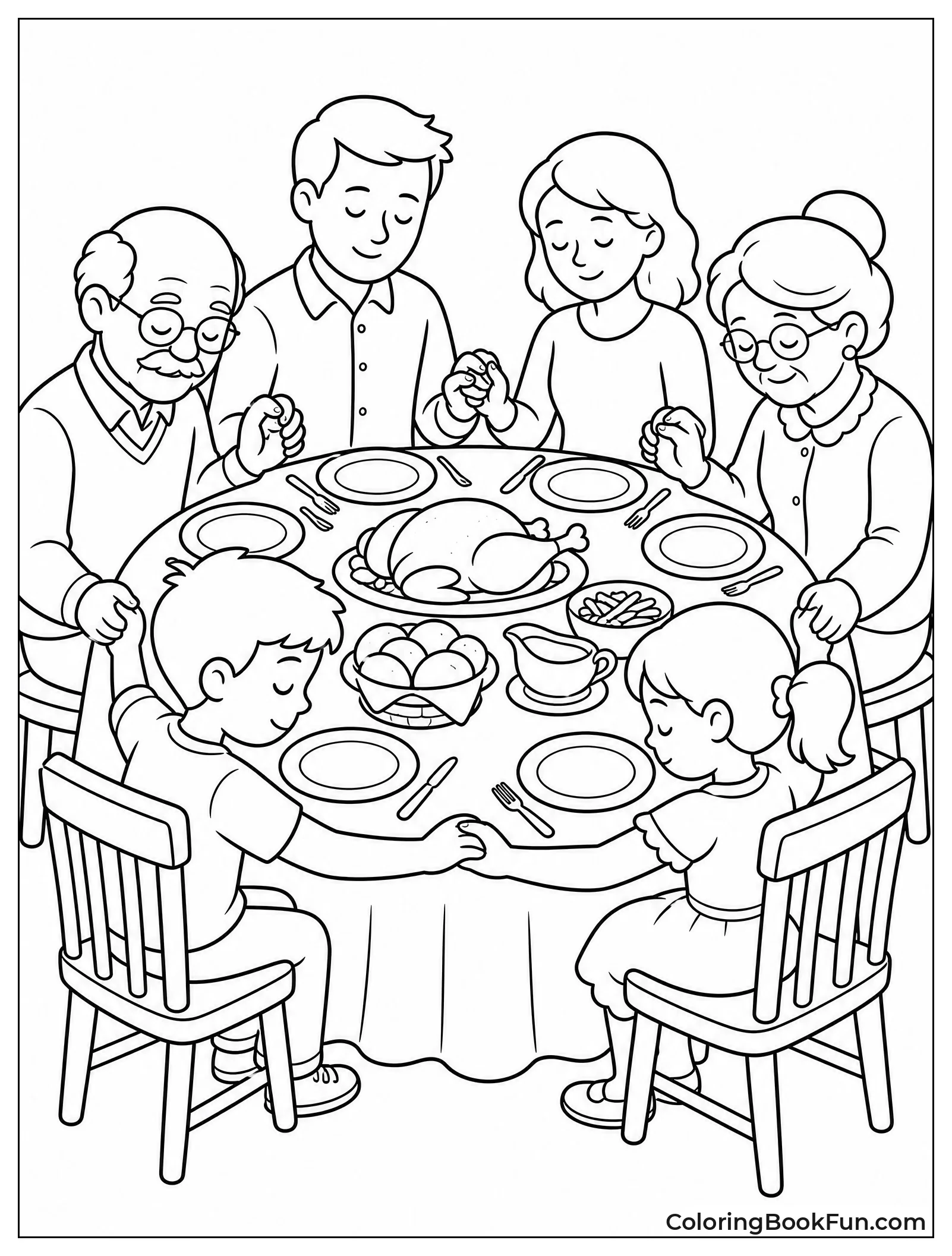 Family Praying at Dinner Table